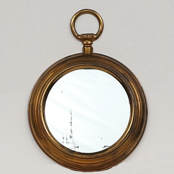 ESPEJO en forma de reloj de bolsillo, segunda mitad del siglo XX.