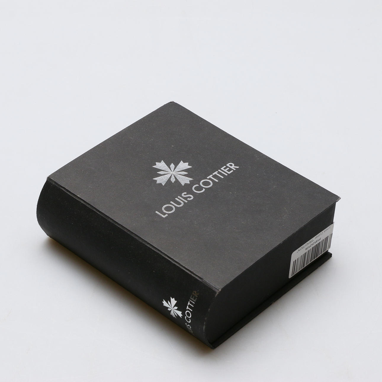 RELOJ DE PULSERA, Louis Cottier, Tradición.