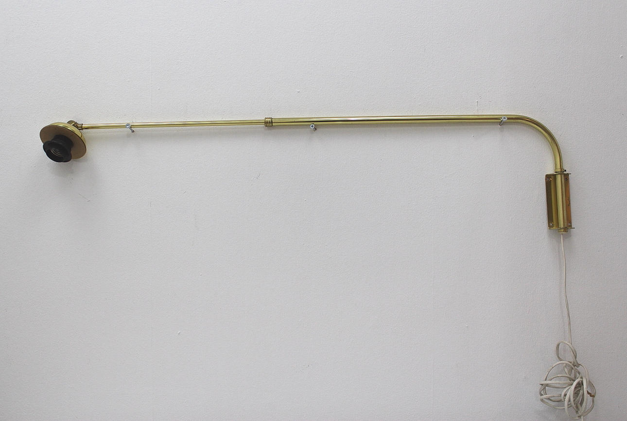 VÄGGLAMPA mässing utdragbar märkt EAE.