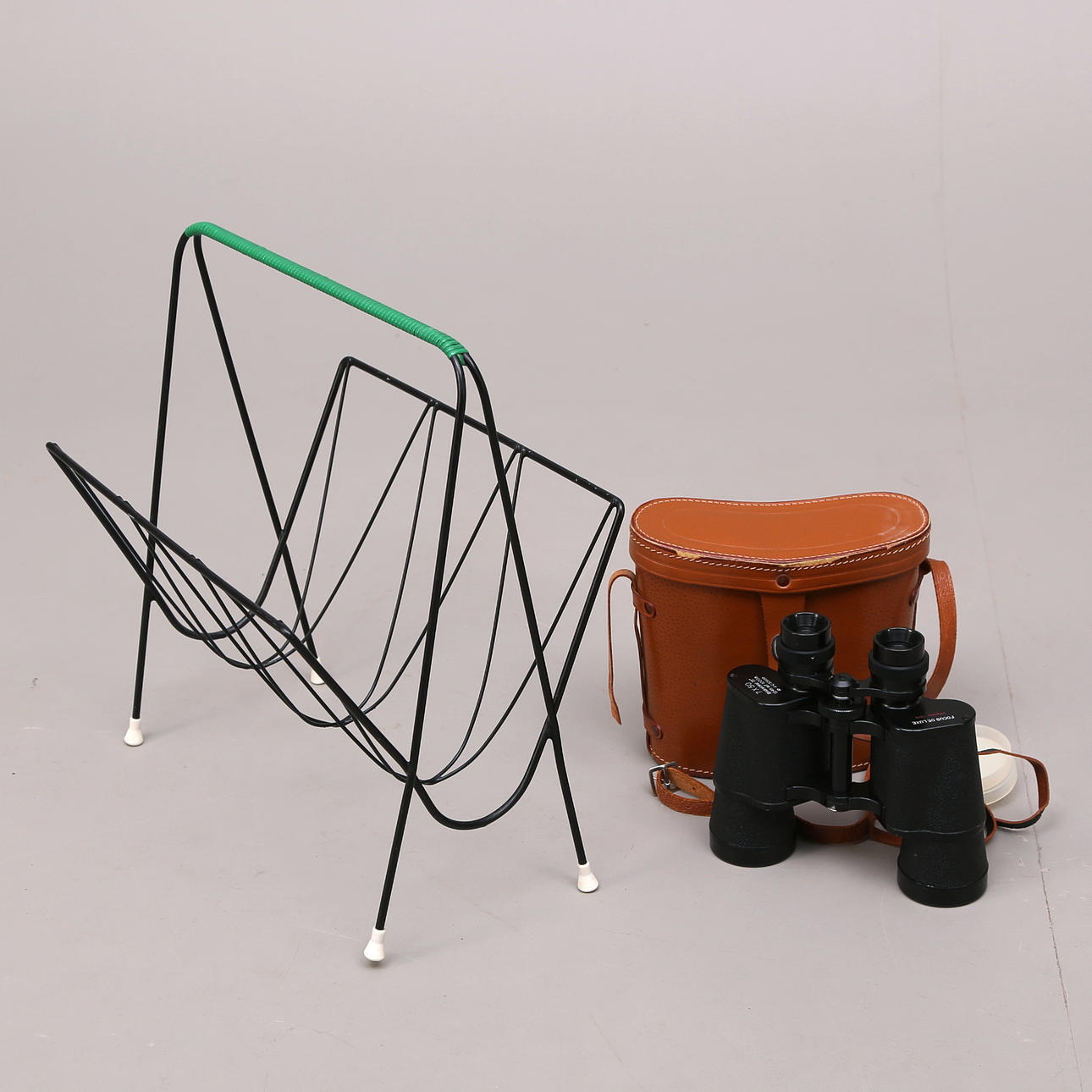 KIKARE, Focus de luxe. TIDNINGSSTÄLL, stringtyp, 1950-tal.