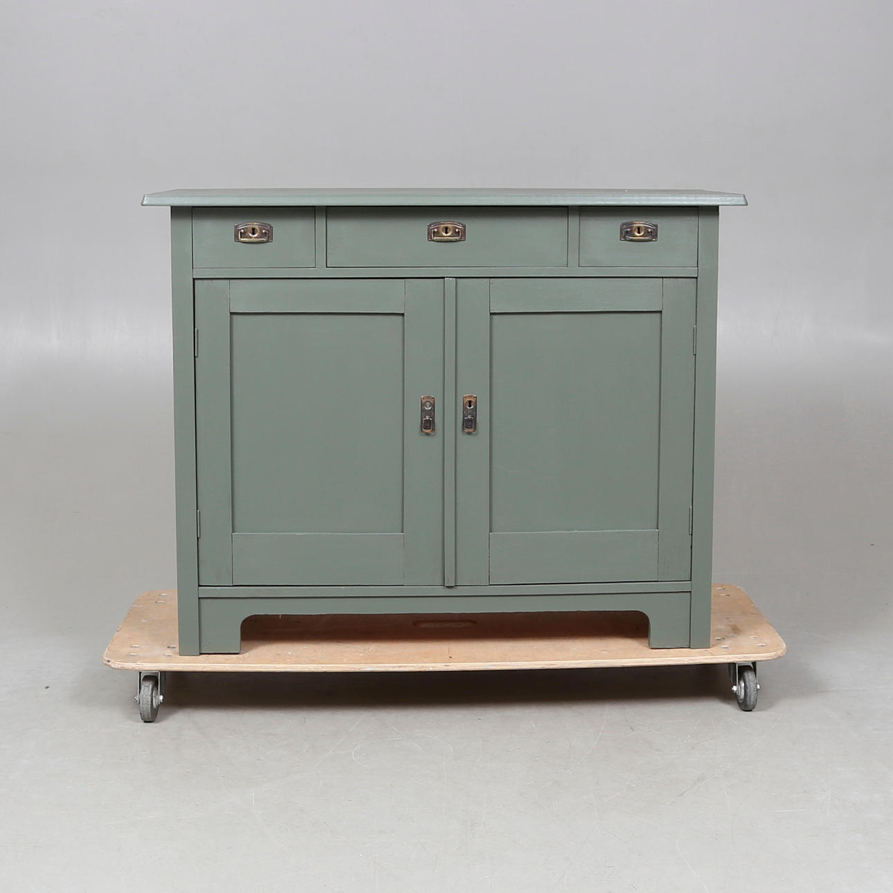 SKÄNK, grön, tre övre lådor.