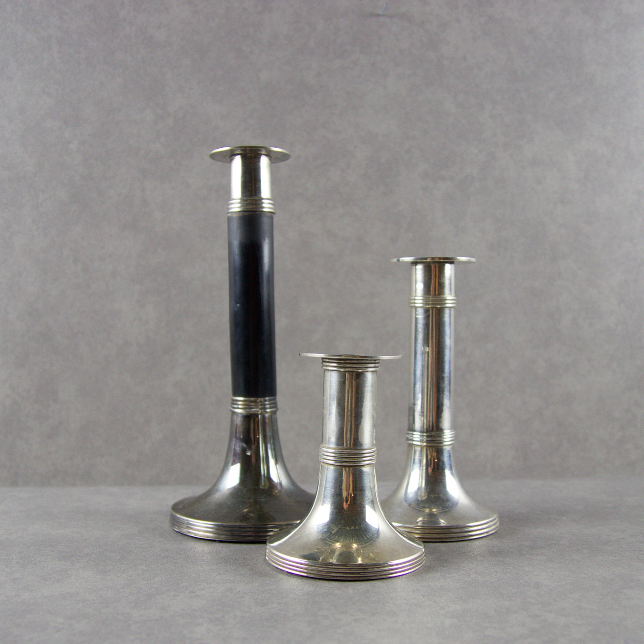 CANDLESTICKS, 3 pcs., Gunther Lambert Collection, Germany.