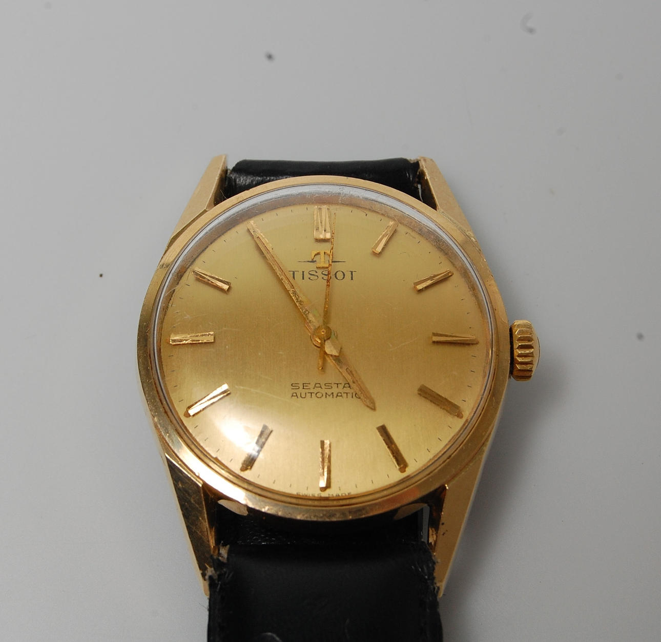 HERRARMBANDSUR, Tissot Seastar, 18 K guld på stål.