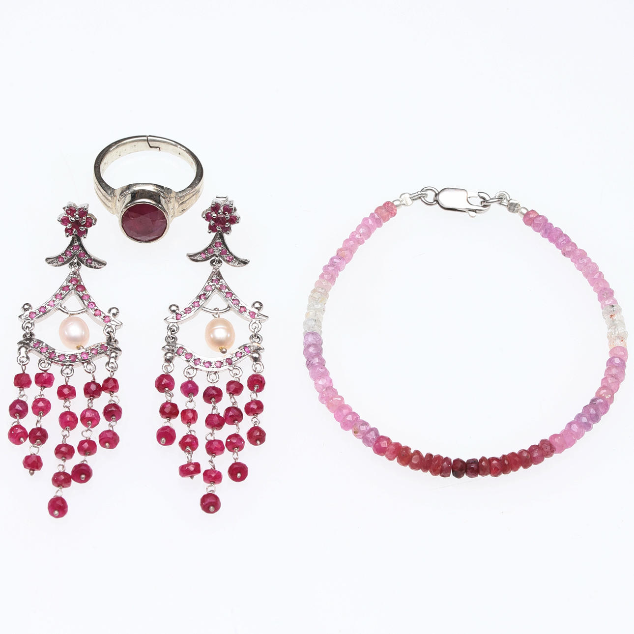GARNITUREN, 3 Stück, Silber, Rubine und Spinelle.