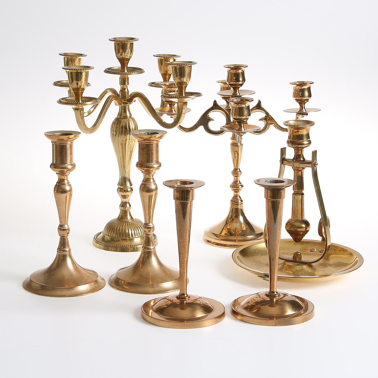 LJUSSTAKAR, 7 stycken, mässing och malm, 1900-tal.