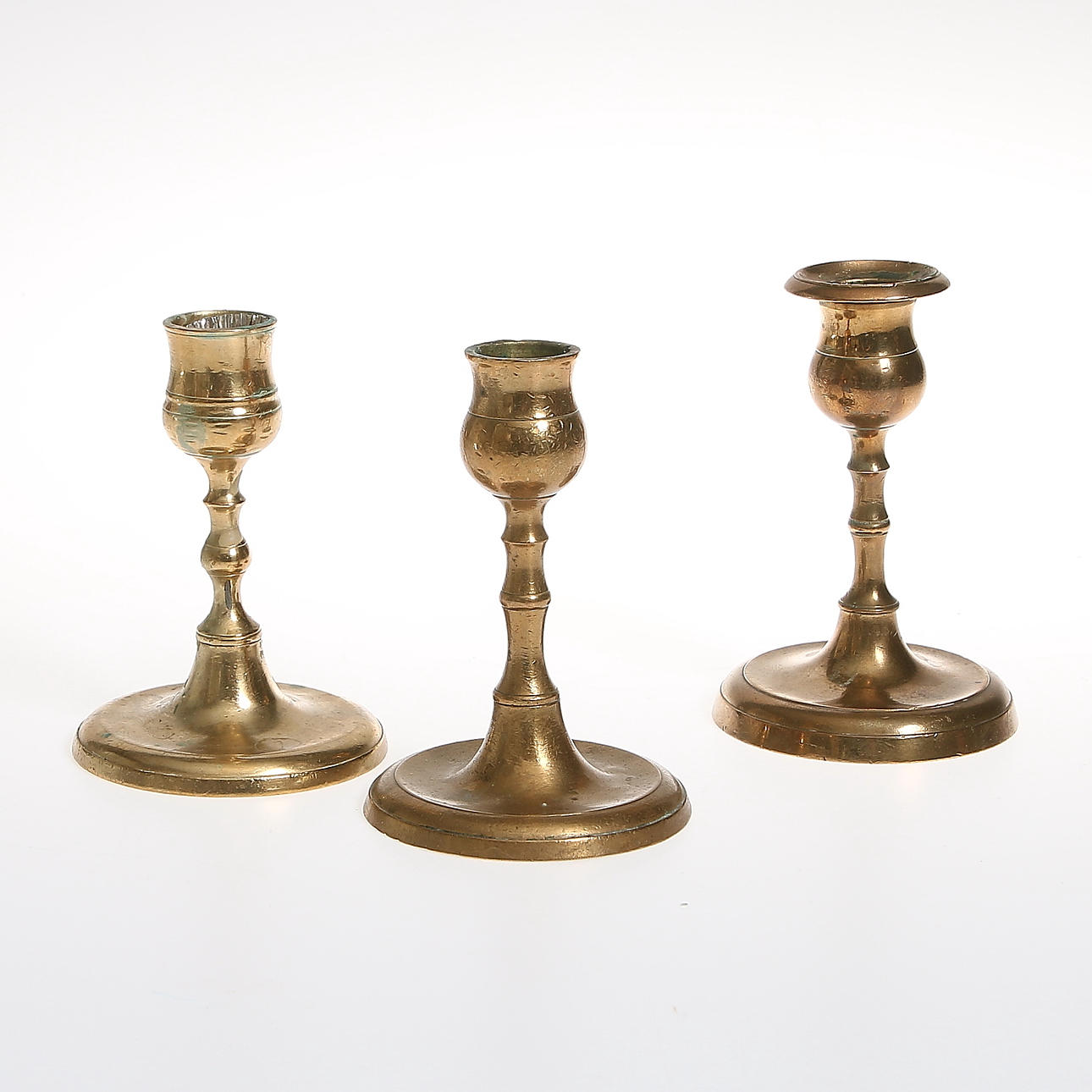 LJUSSTAKAR, 3 st, mässing. bl.a. Nils Petter Linderberg, Sundsvall, 1850-1870.