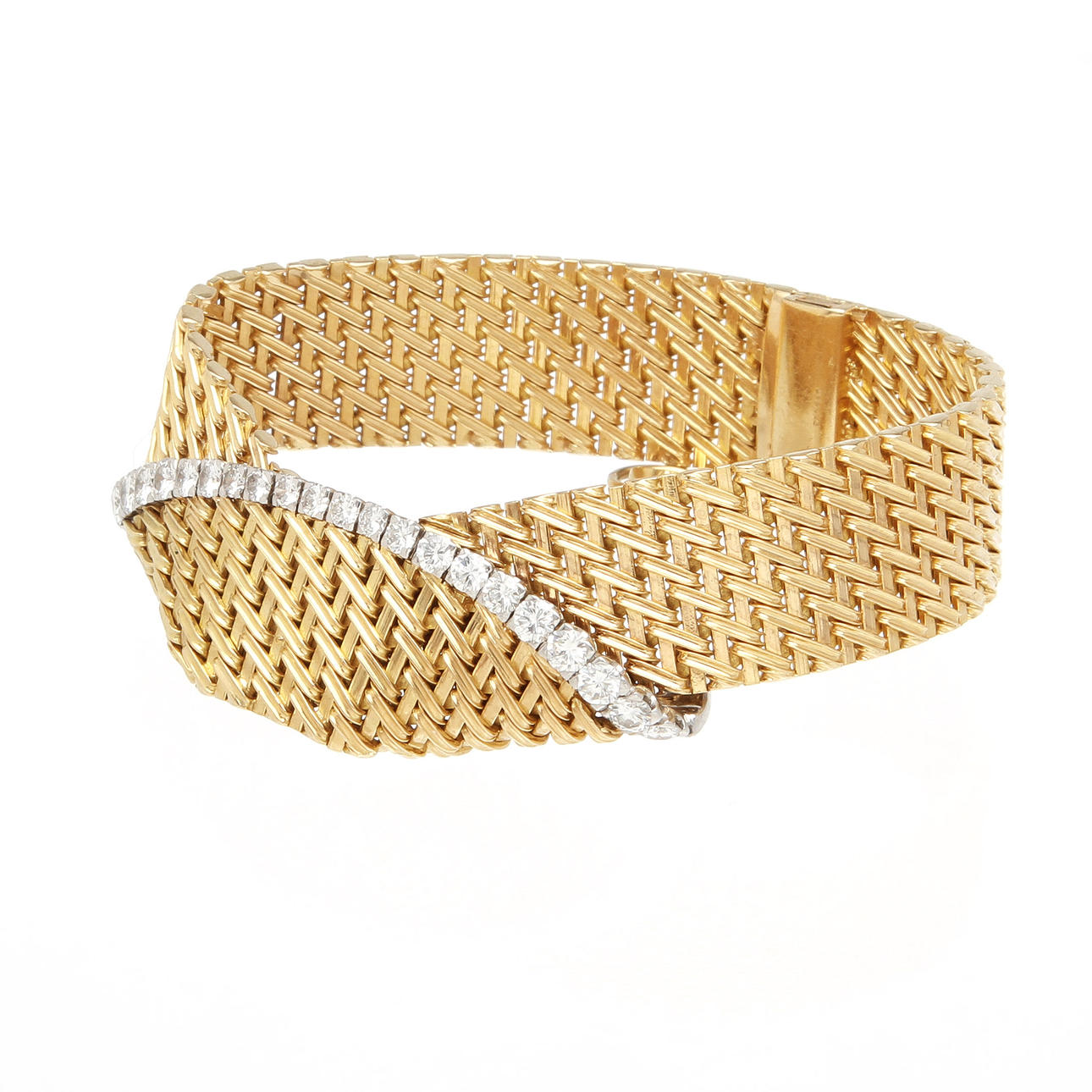 ARMBAND, 18k guld med 22 diamanter, totalt ca 3,3ct. Vikt ca 75 gram.