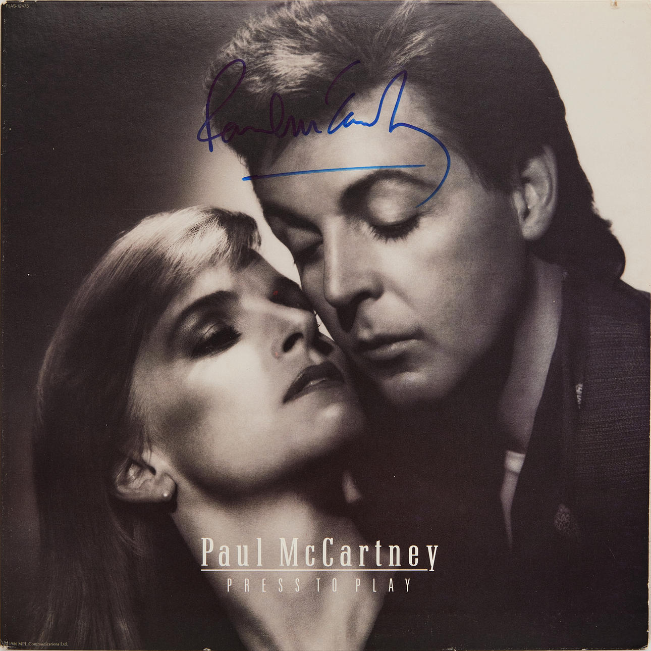 Paul McCartney, álbum firmado.