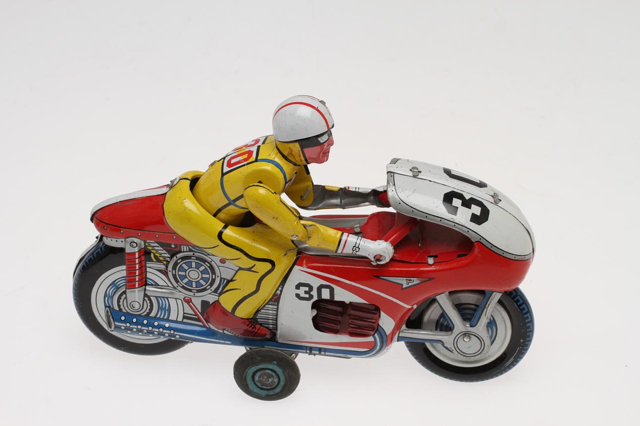 MODERN TOYS MC friktion med blixtljus. Ledad förare.