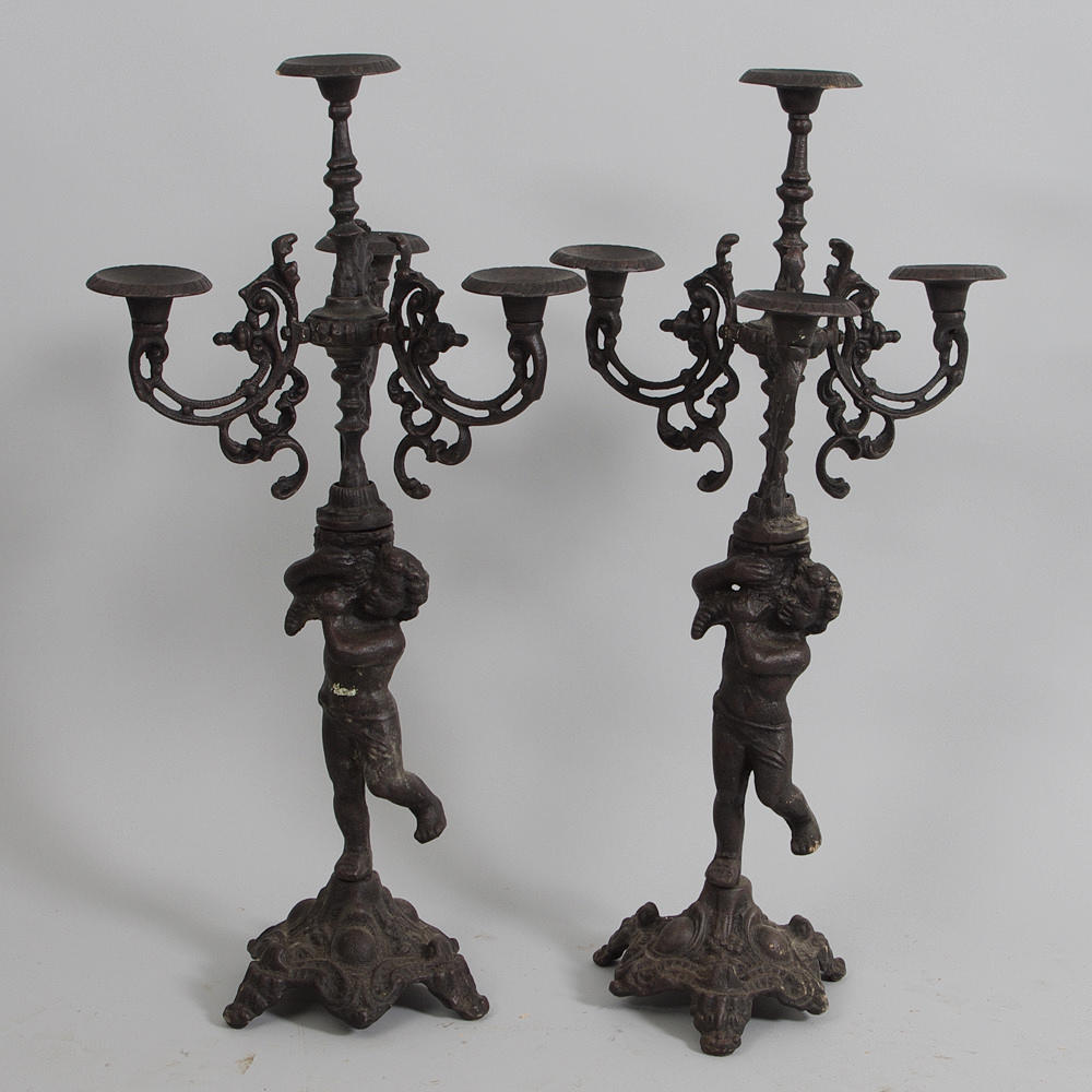 KANDELABRAR, 1 par 4-armade, gjutjärn, samtida.