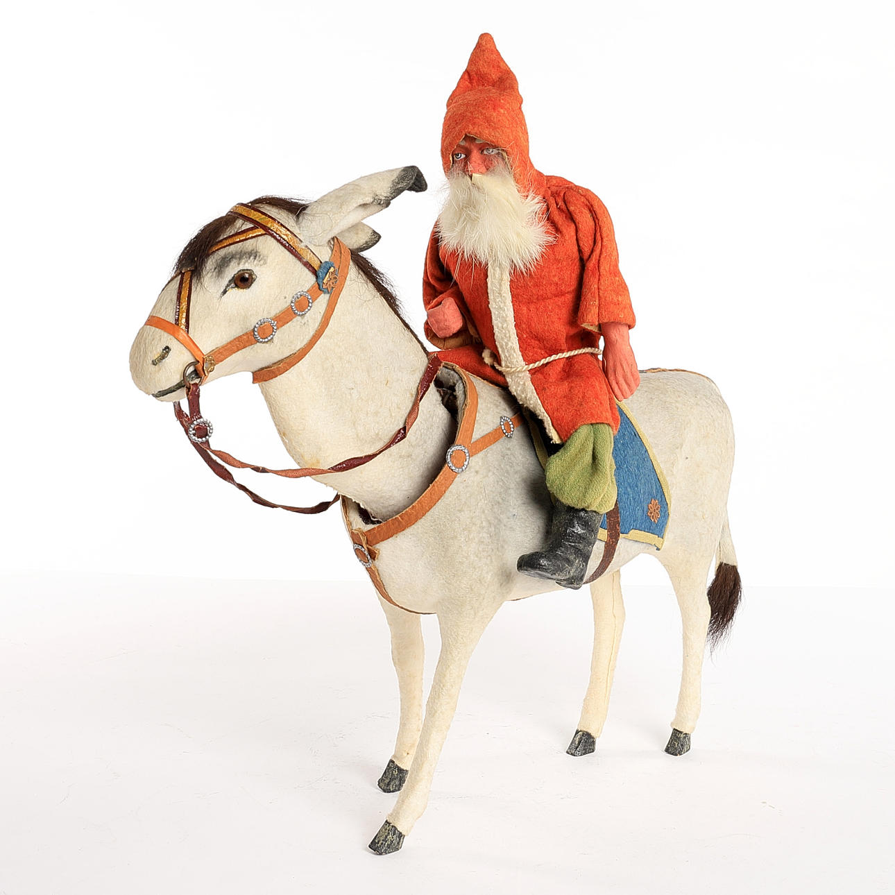 Santa sitting on a donkey, 1920s, clockwork.
