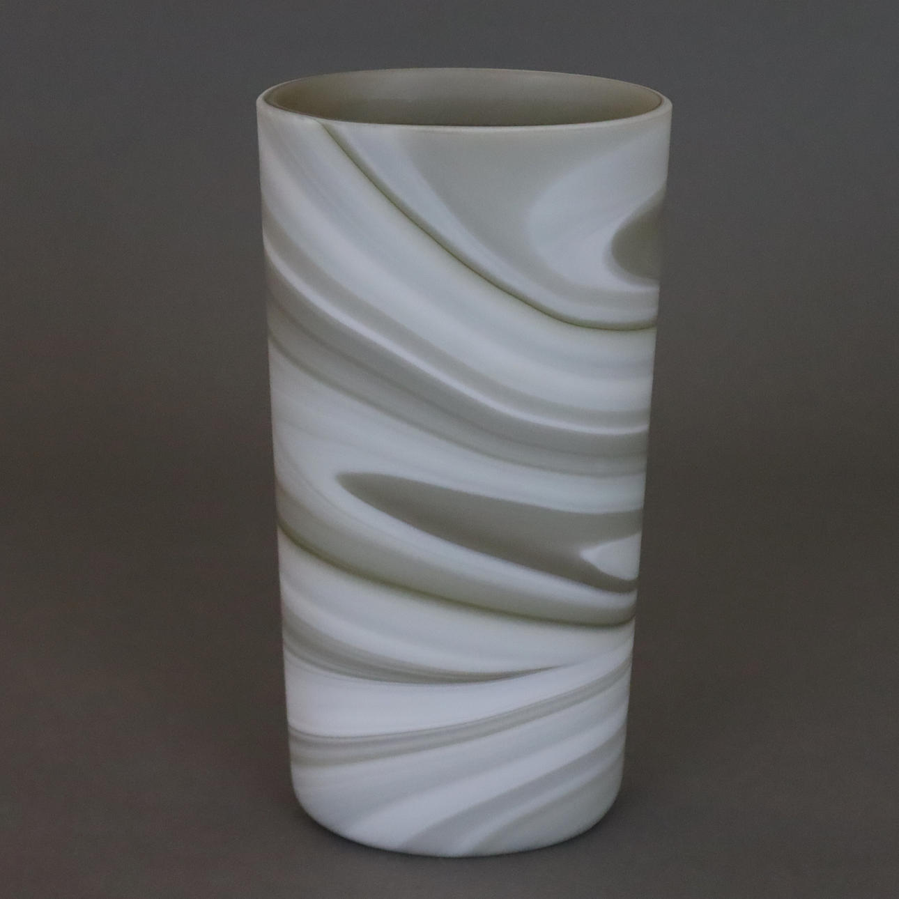 - VASE - multi-layered glass with colored inclusions.