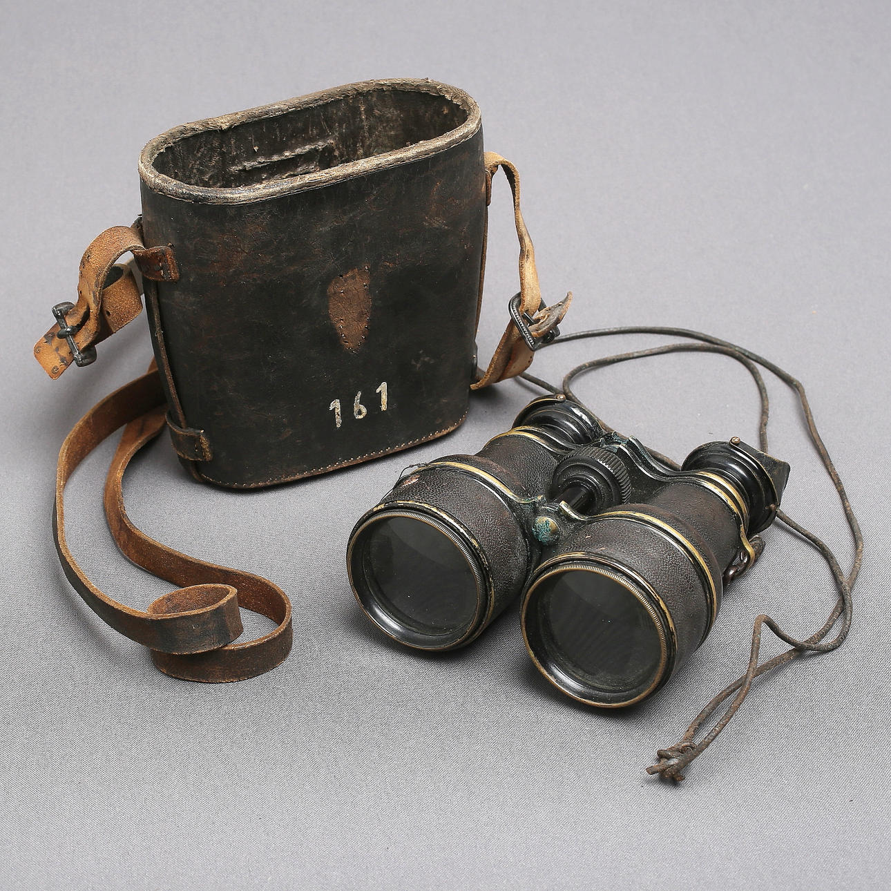 BINOCULARS, possibly military, indistinctly marked.
