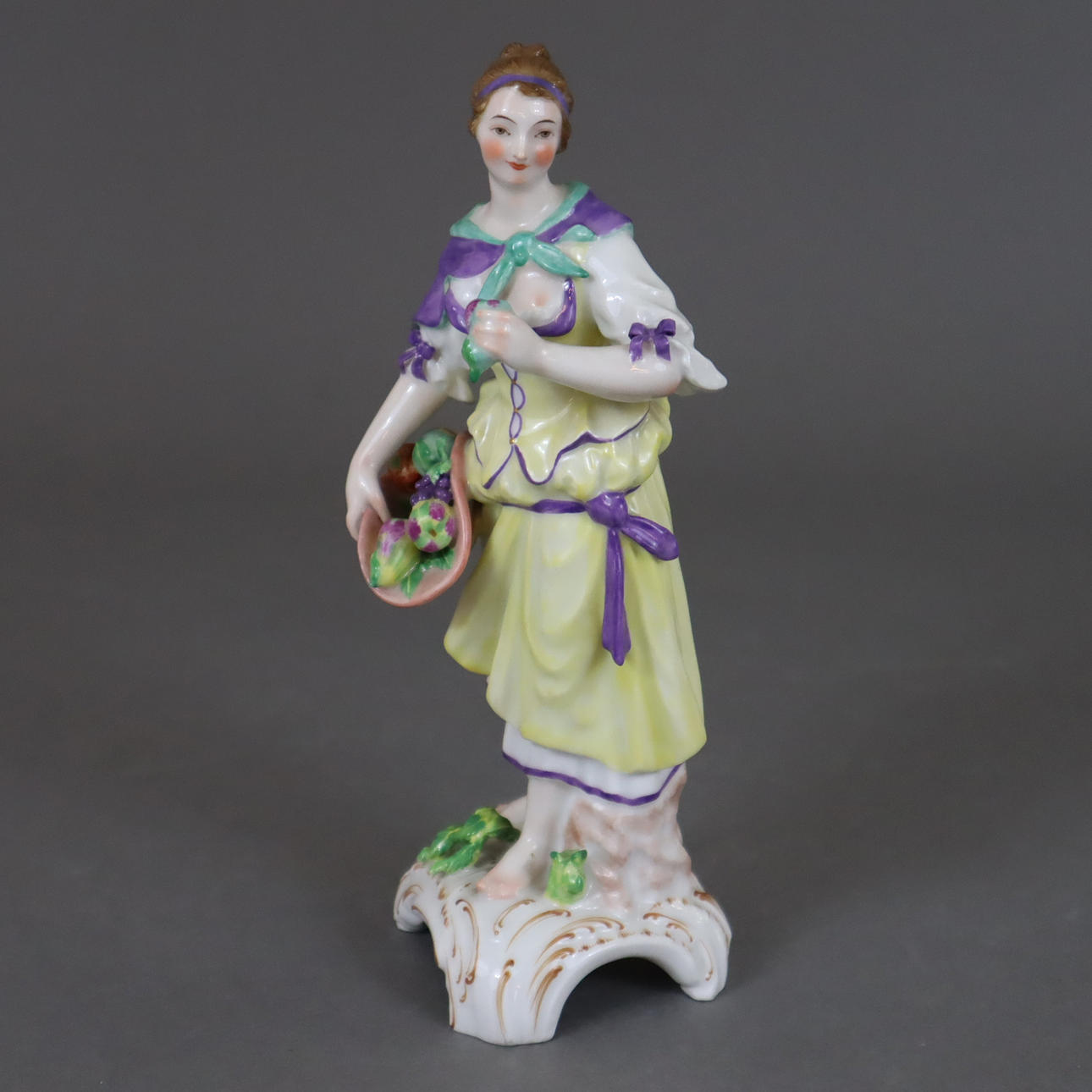 F.E. MEYER. Flora with fruit basket - KPM Berlin, 20th century.