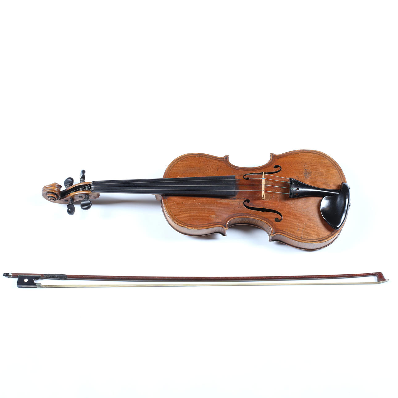 VIOLIN with bow, labeled Giovan Paolo Magini.
