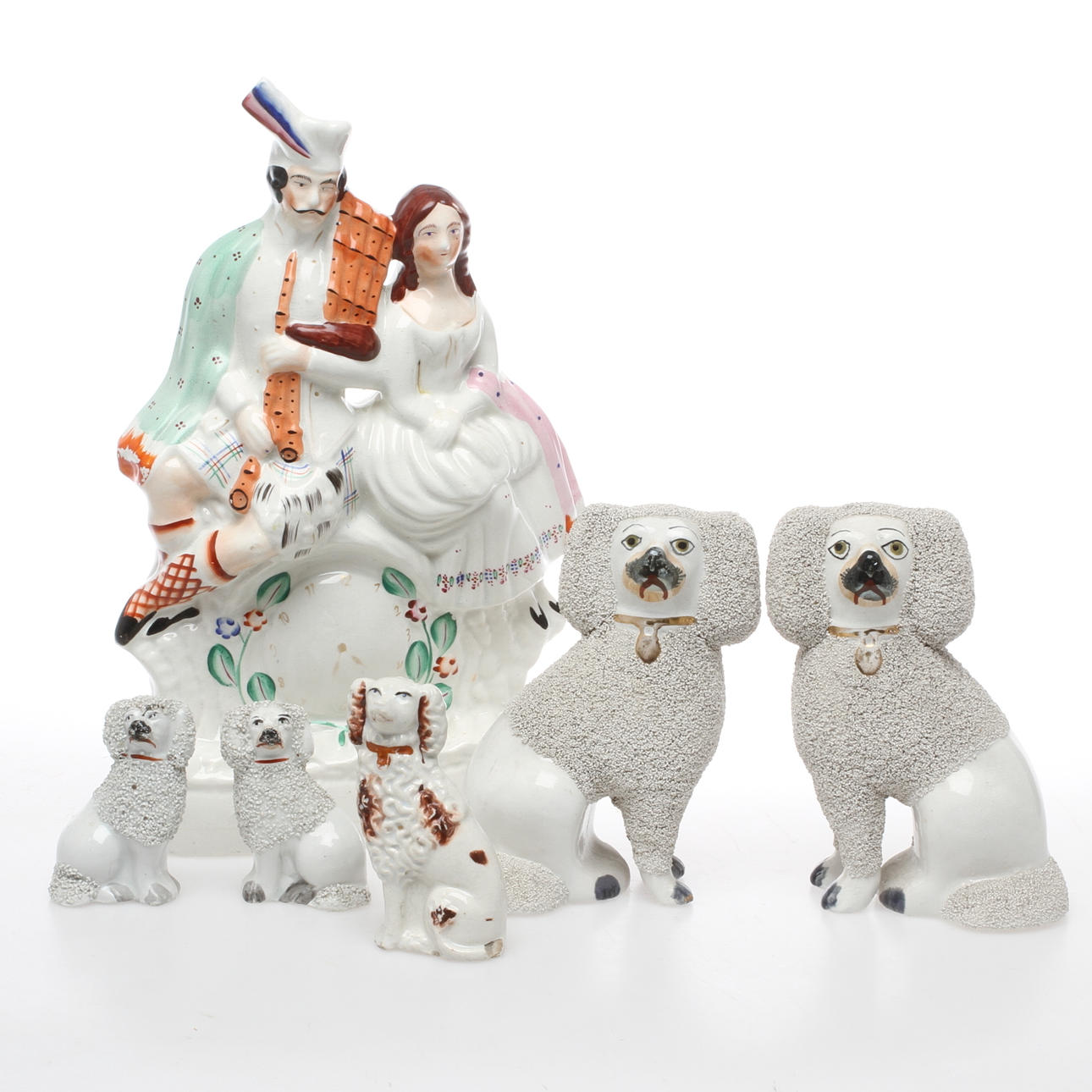 HEMVÄNDARHUNDAR samt FIGURIN, 6 delar, 1900-talets första hälft.