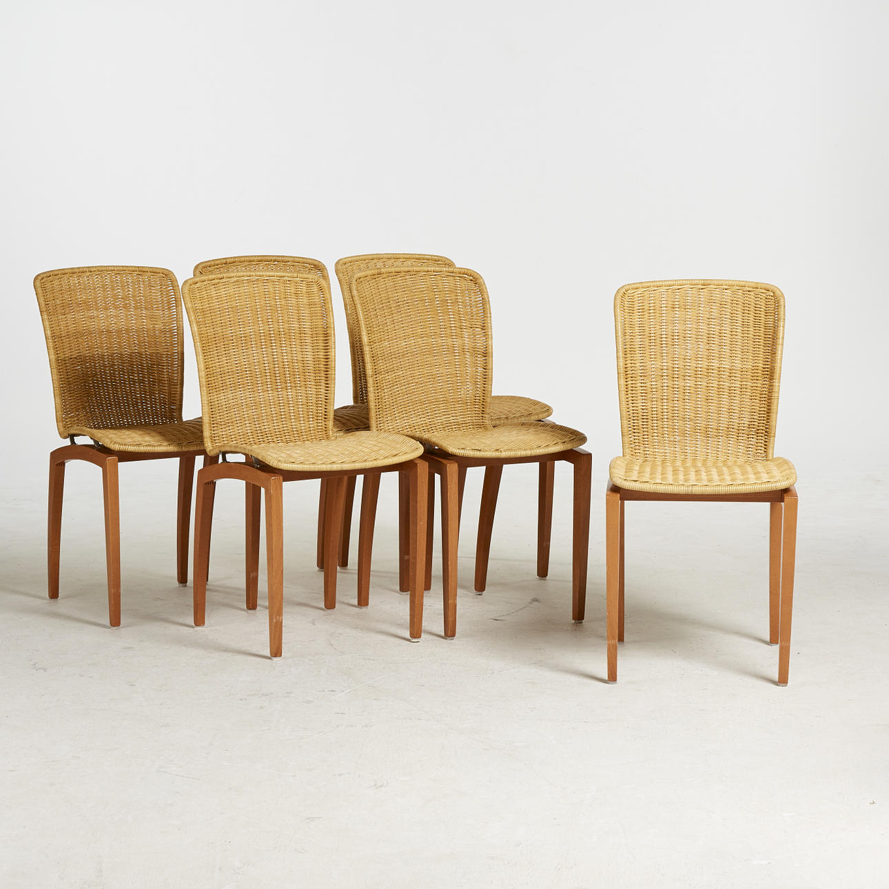 LIGNE ROSET, 6 sillas "libra", madera de peral y ratán.