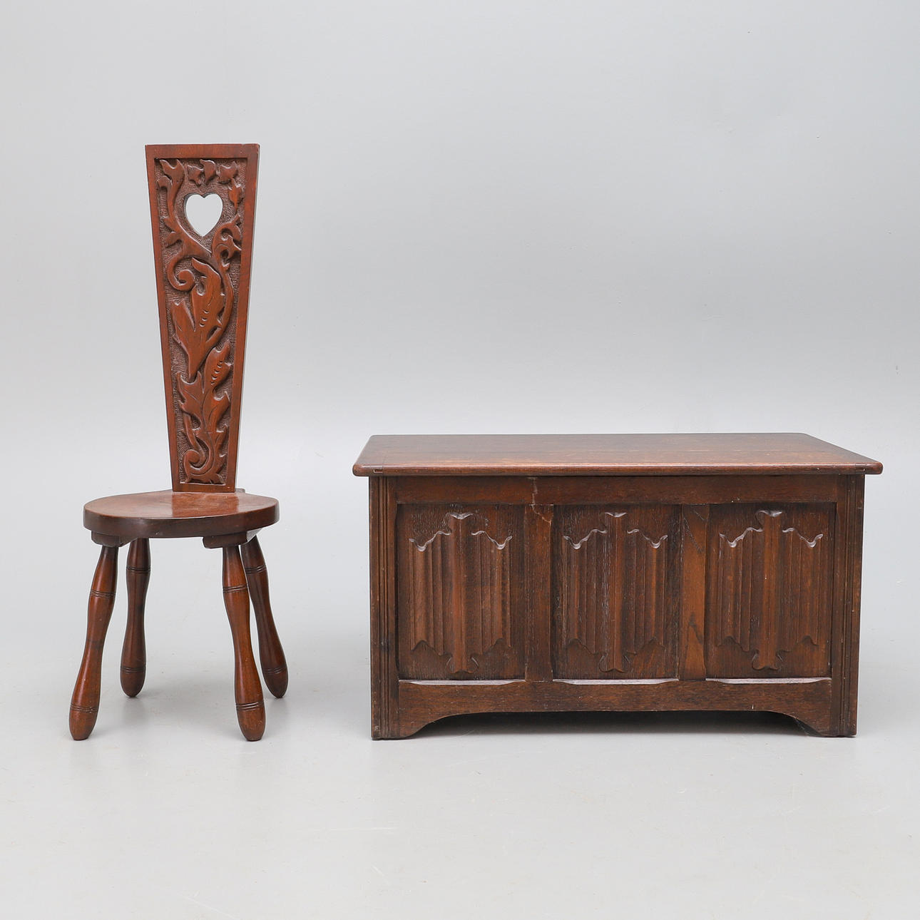 A WALNUT PATIENCE STOOL.