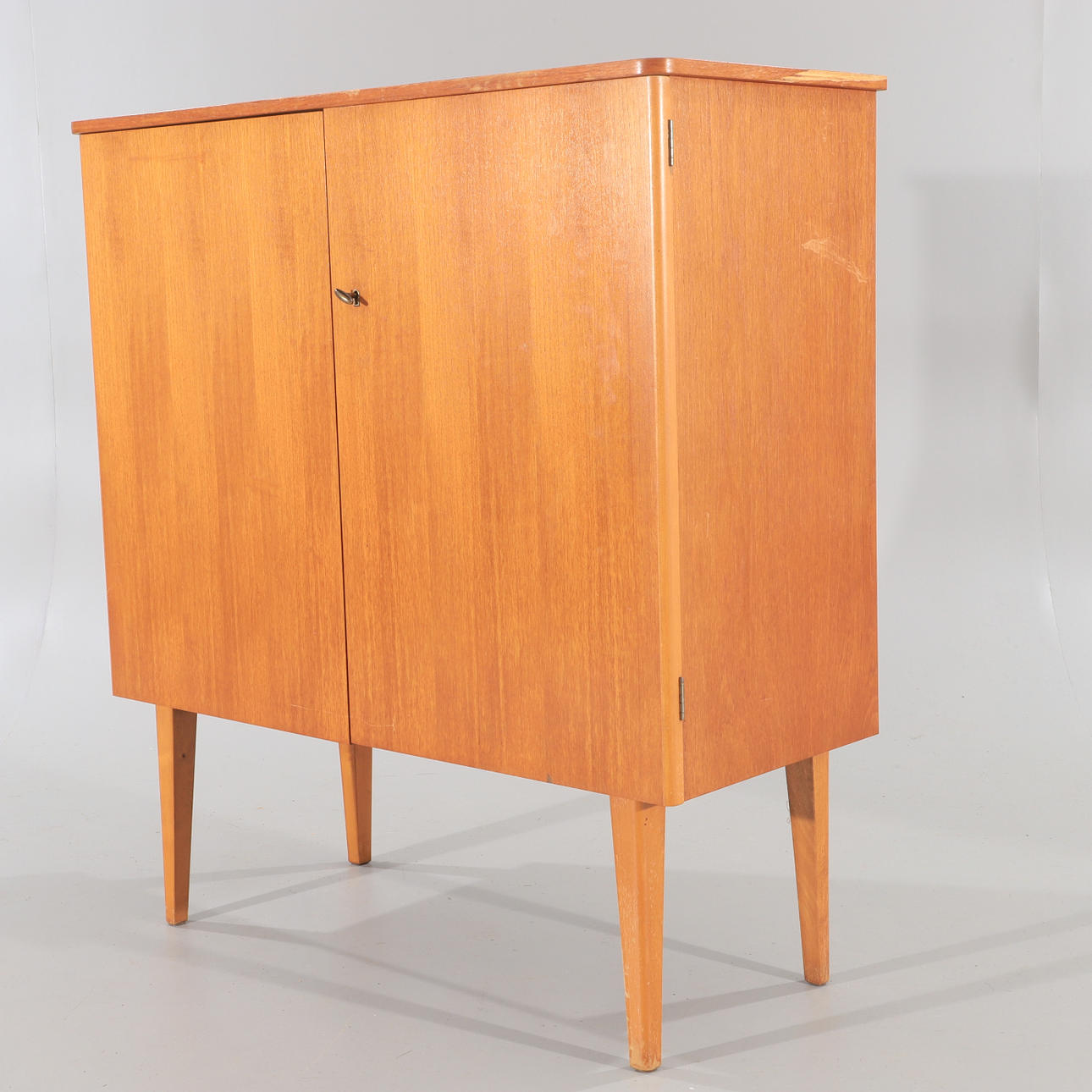 CABINET, teak, mid-20th century.