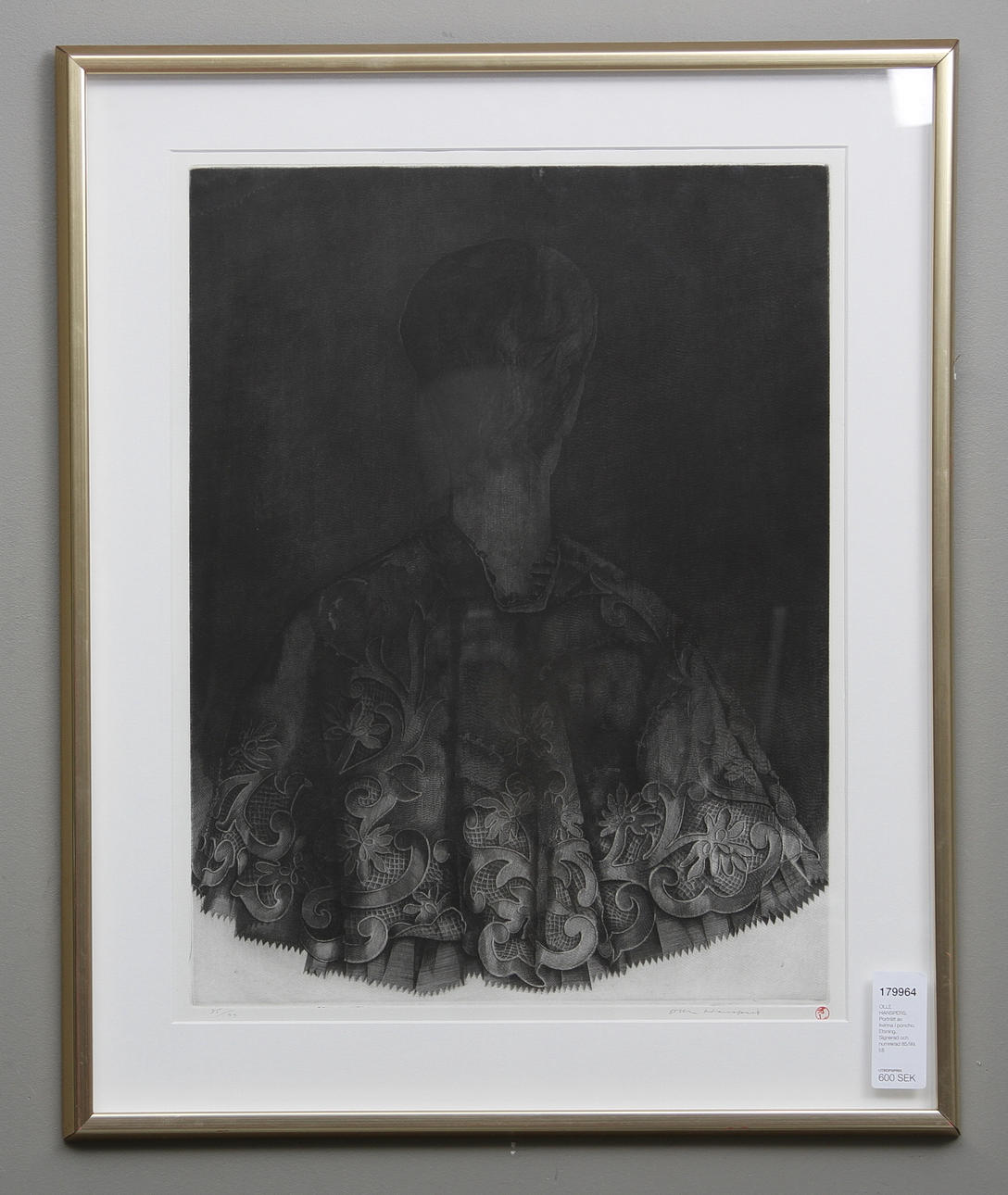 OLLE HANSPERS. Porträtt av kvinna i poncho. Etsning. Signerad och numrerad 85/99.