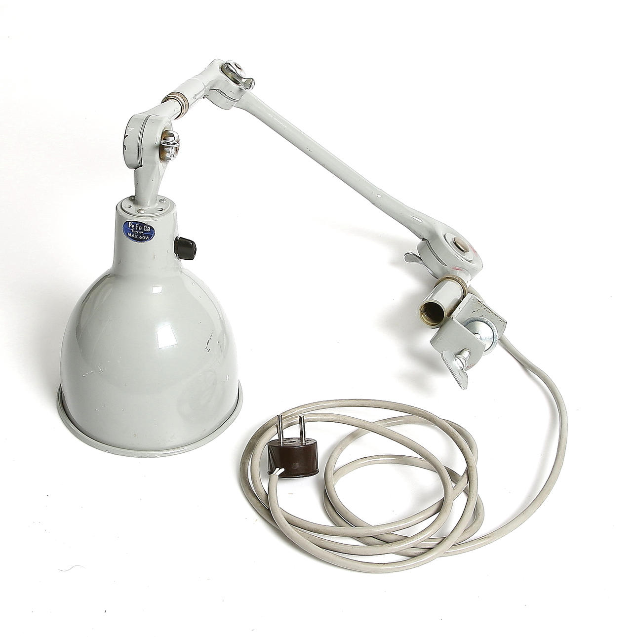 INDUSTRILAMPA, Pefege. 1900-talets mitt.