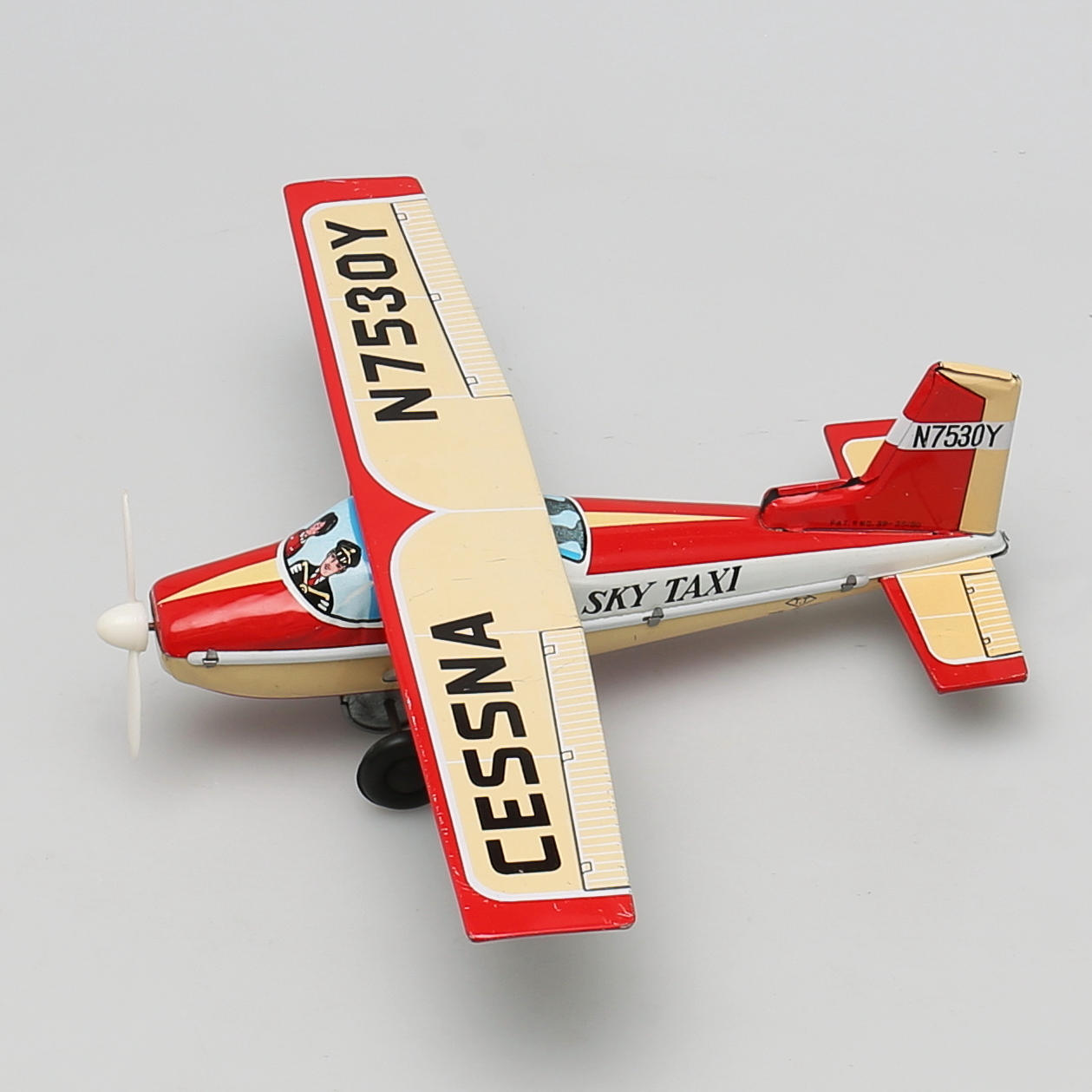 LEKSAKSPLAN i plåt. Sky taxi. Japan.