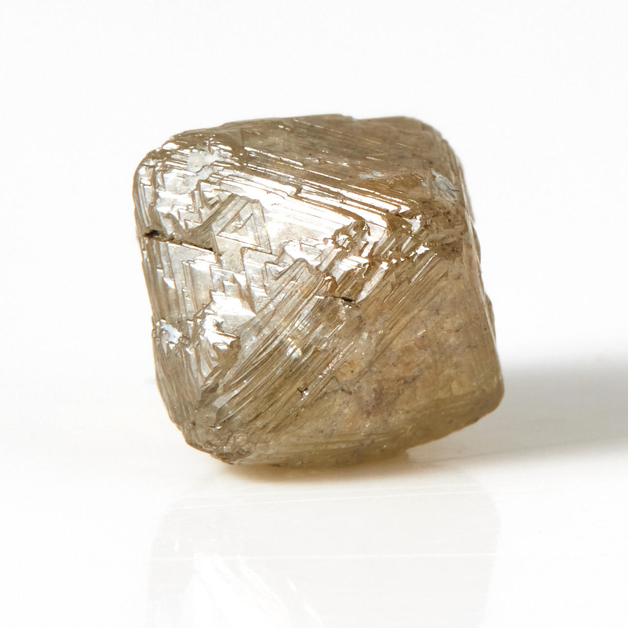 ROUGH DIAMOND, octahedral shape, surface with many trigons.