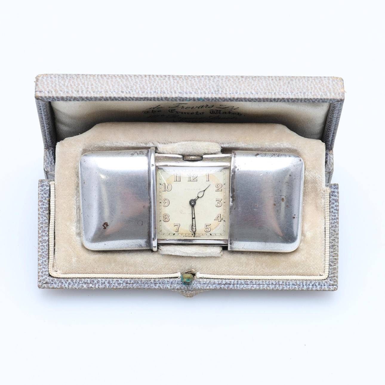 MOVADO. A SILVER CASED PURSE WATCH.