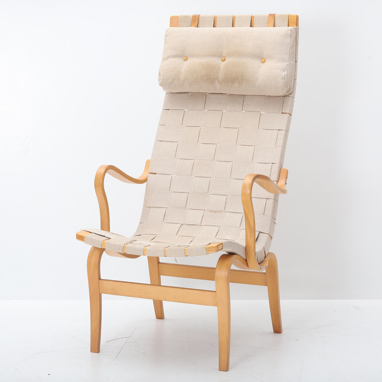 BRUNO MATHSSON. Fåtölj, "Eva" med hög rygg, Dux.