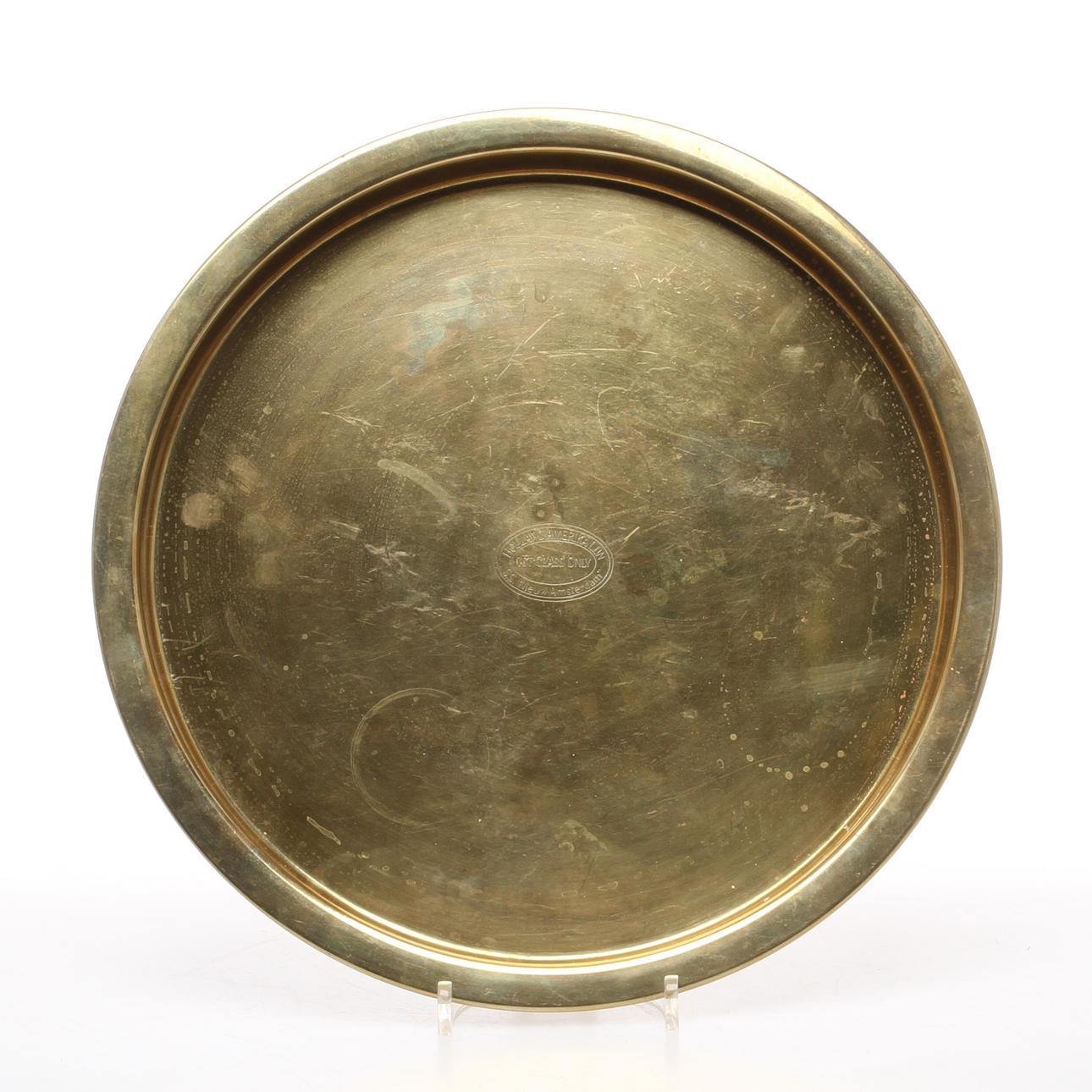 BRICKA, mässing, "Holland Amerika Lijn, 1st class only, S.S. 'Nieuw Amsterdam'".