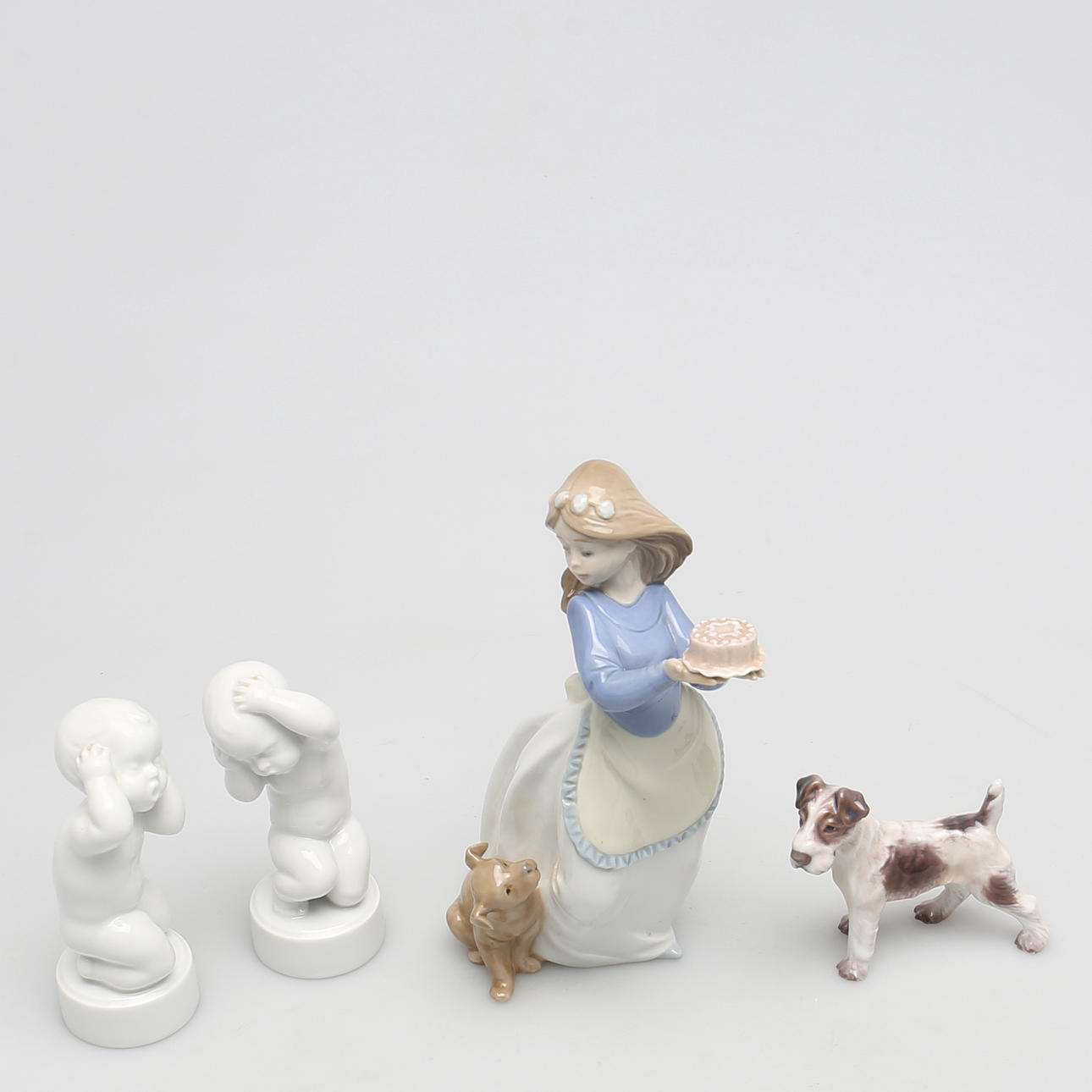 PARTI FIGURINER i porslin. 4 st. Bla. Lladro och Bing & Gröndahl, Danmark.