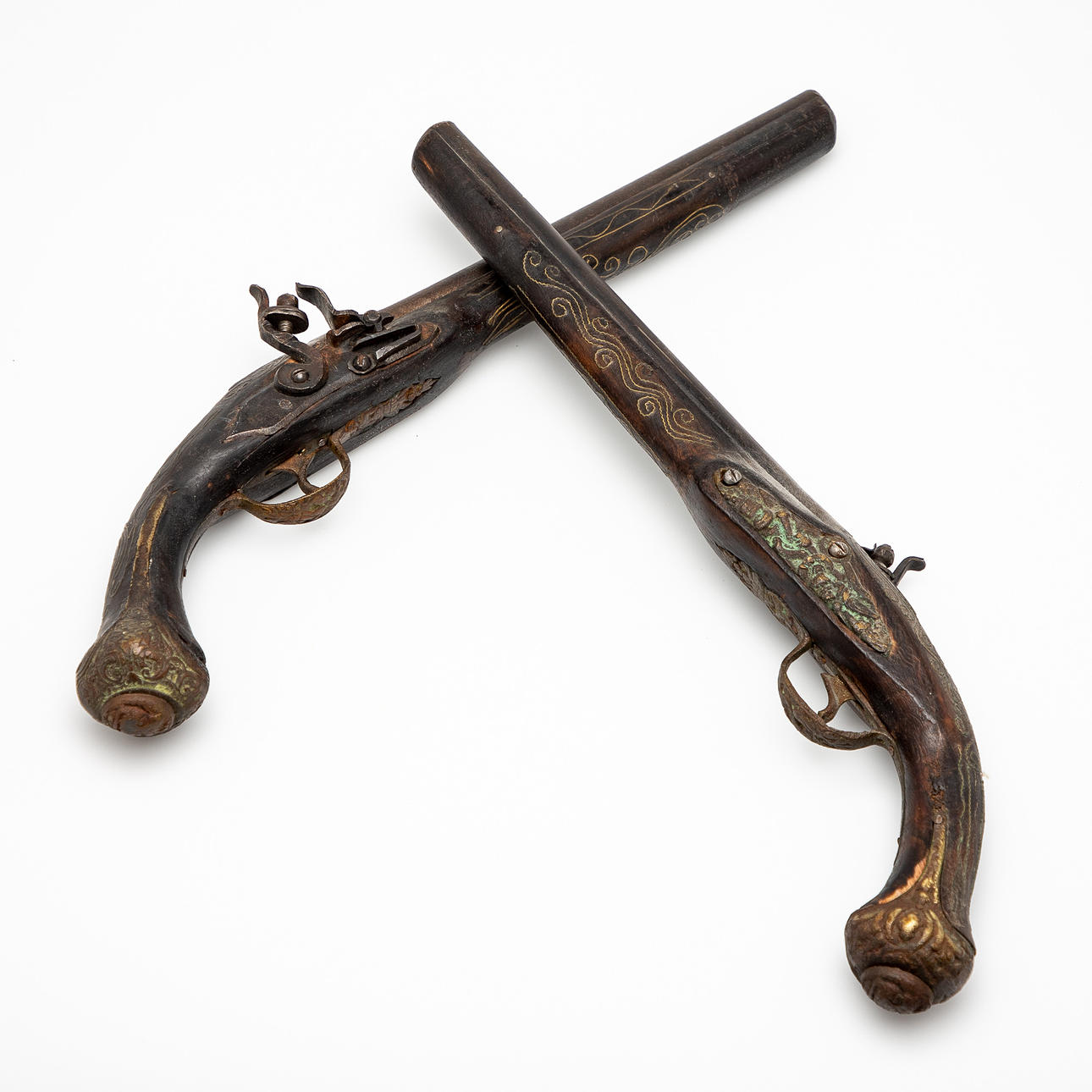 Two muzzleloaders / pistols / flintlock, wood, metal (2).