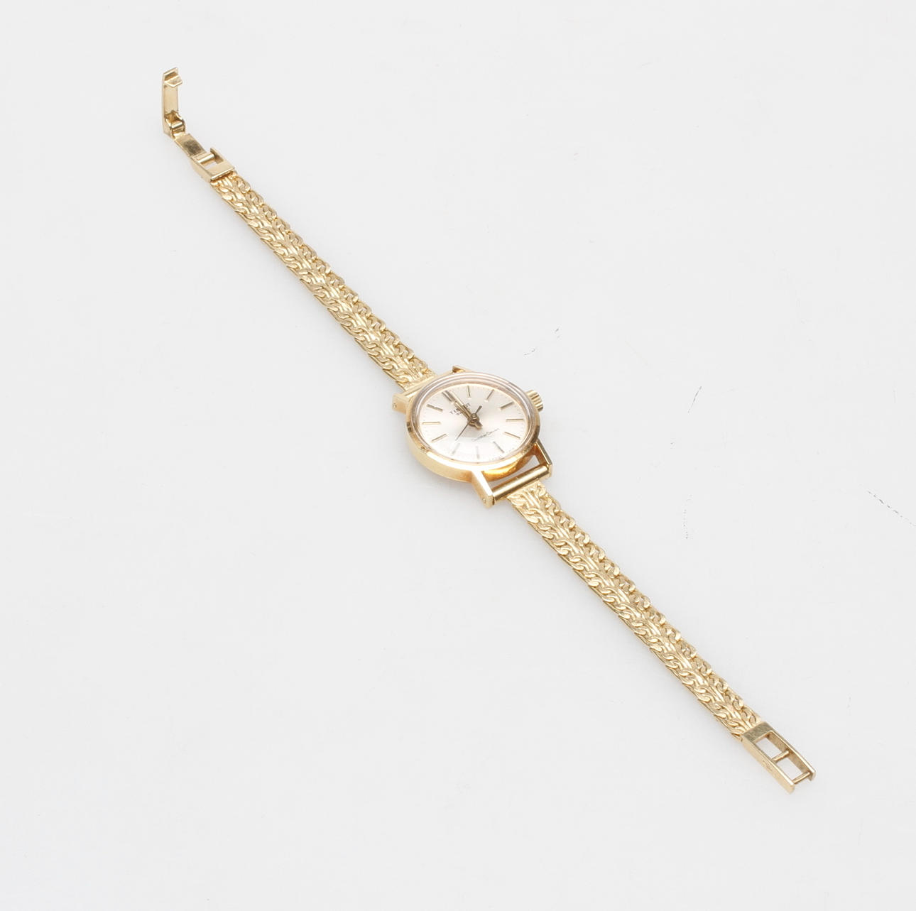 DAMARMBANDSUR med ARMBAND, guld 18k, Tissot SeastarSeven, vikt totalt ca. 24,2 gram.