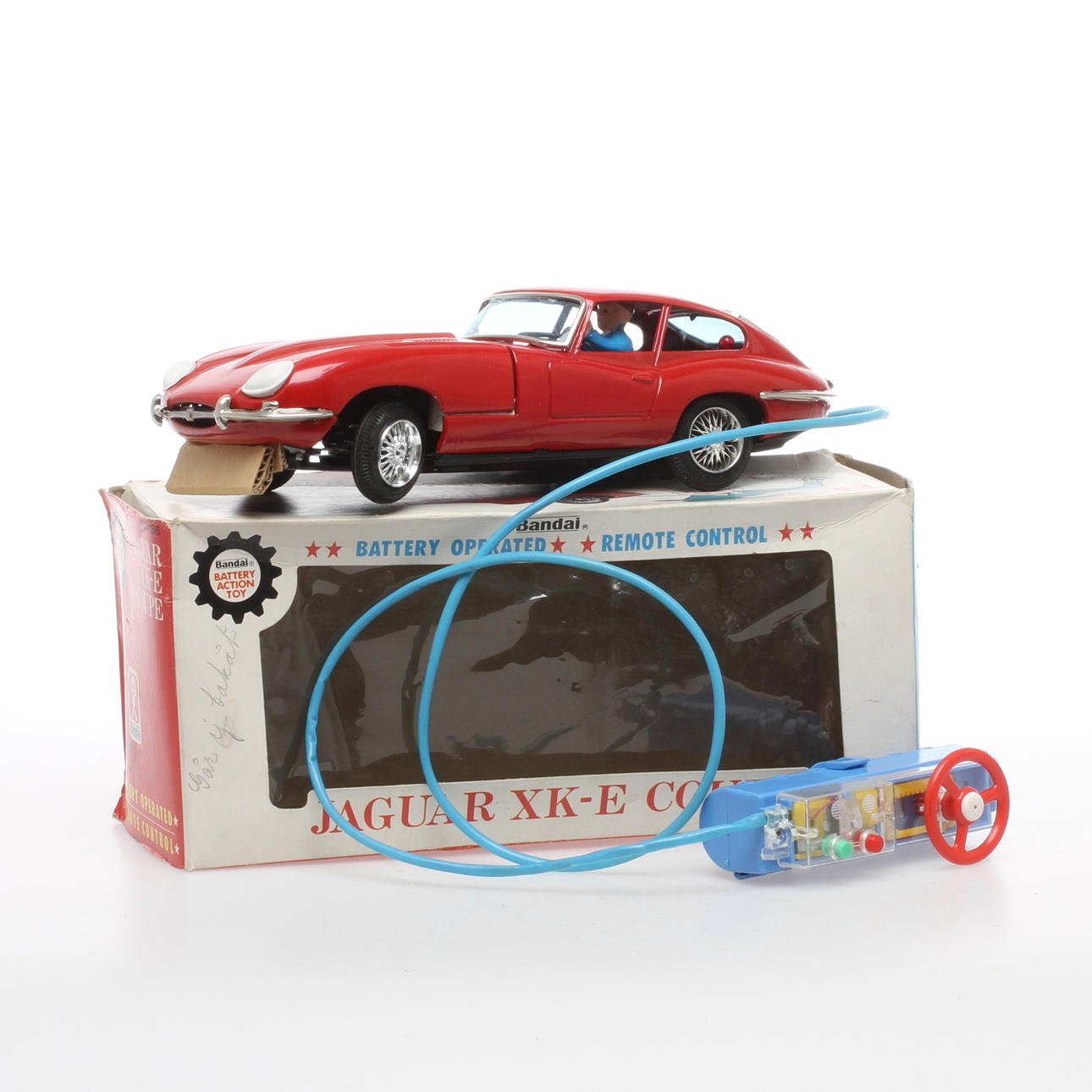 PLÅTBIL BANDAI JAPAN, JAGUAR XK-E COUPE. Batteri och trådstyrd. Originalkartong.