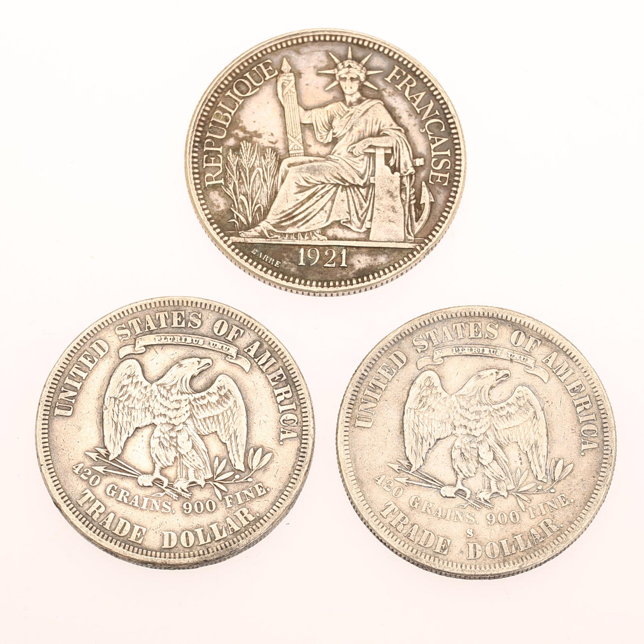 MYNT, 3 stycken, bl a trade dollar.