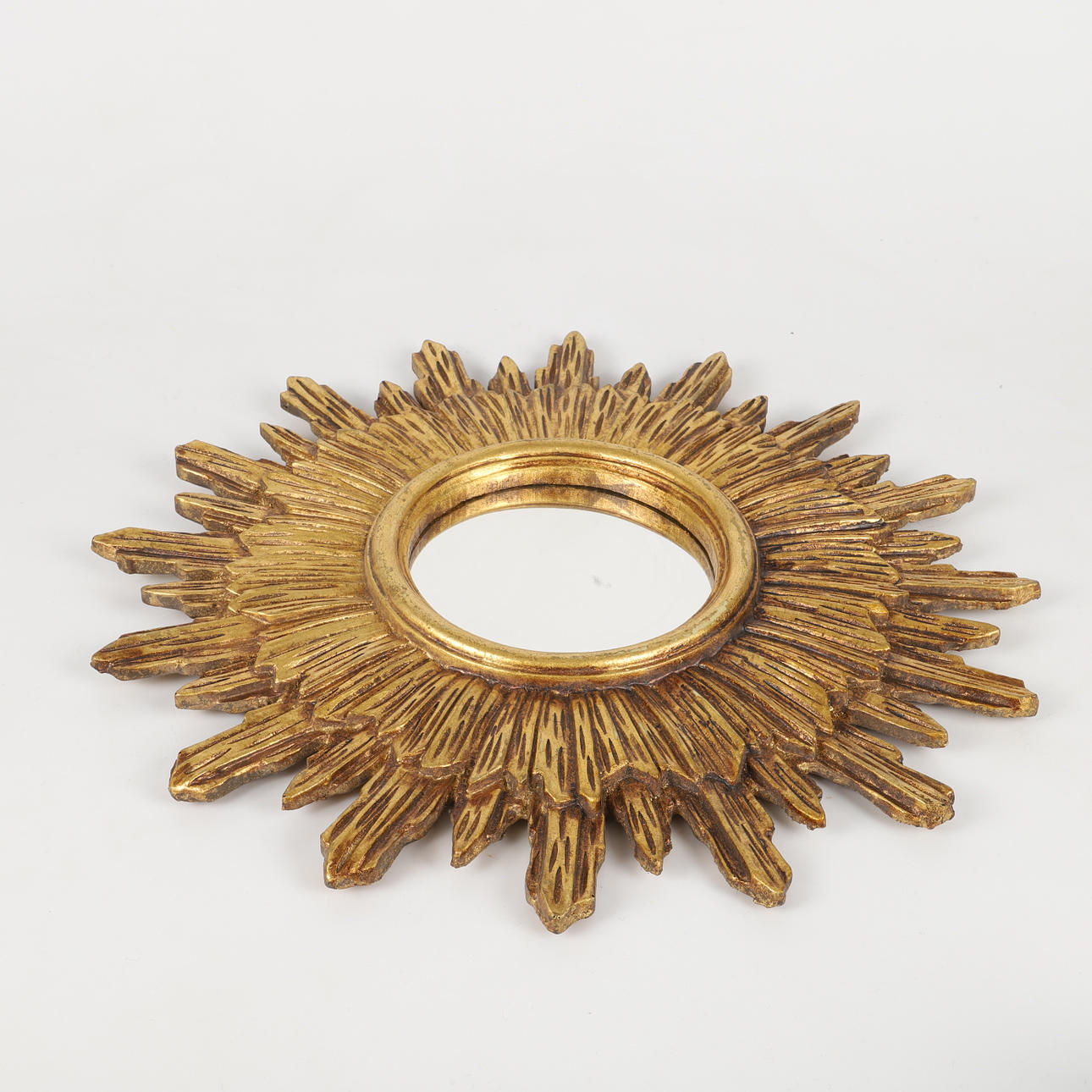 SUN MIRROR, gilt, 20th century.