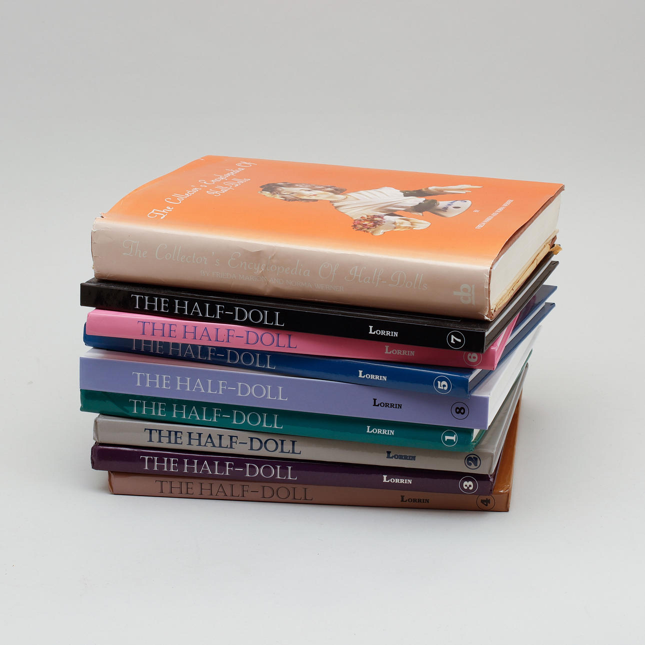 BOOKS ABOUT HALF DOLLS, 9 volumes.