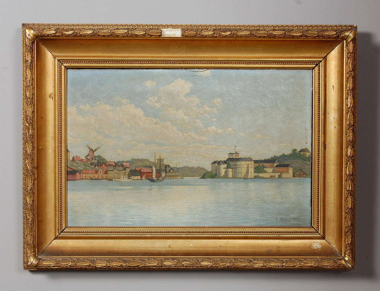 OKÄND KONSTNÄR. "Waxholm sedt från Ekholmen" signerad C Nyberg 1890.