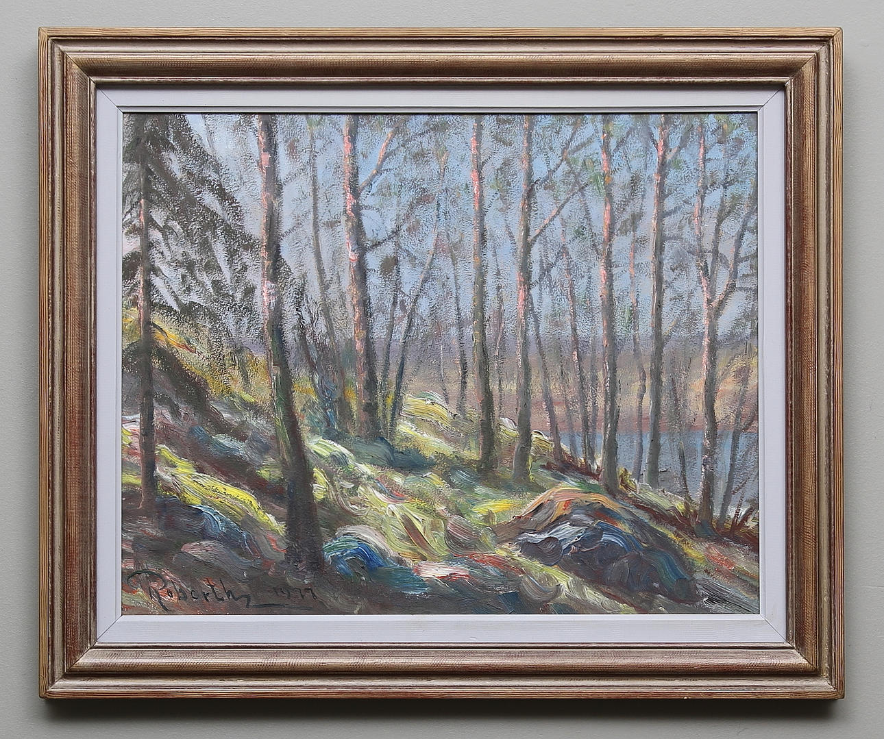 ROBERTH KARLSSON. Skogslandskap, olja på pannå, signerad och daterad 1977.