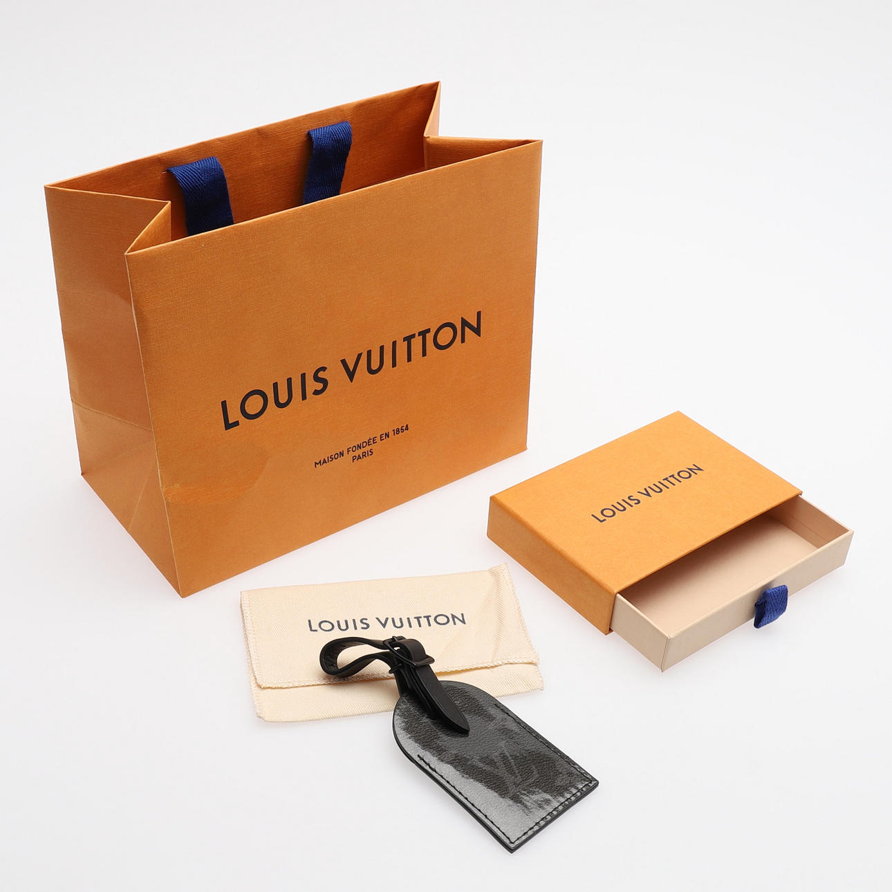 LOUIS VUITTON, ADRESSTAG.