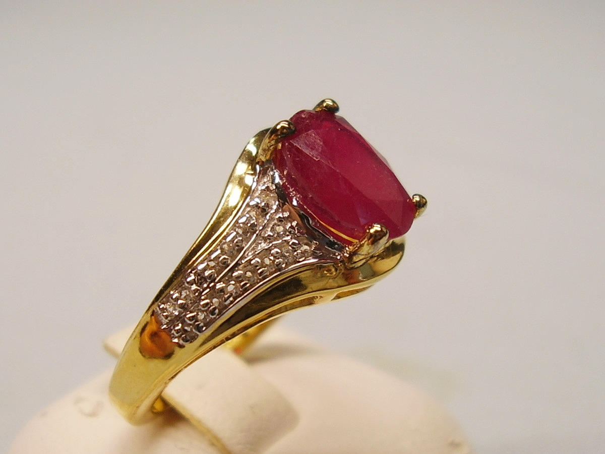 RUBIN RING SILBER & GELBGOLD.