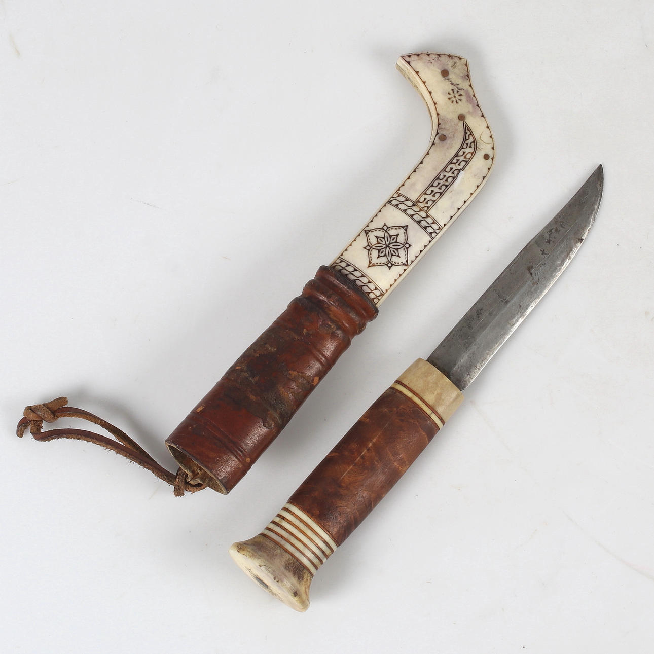 ANDREAS POGGATS, Sami knife, horn and leather, signed. Weapons ...
