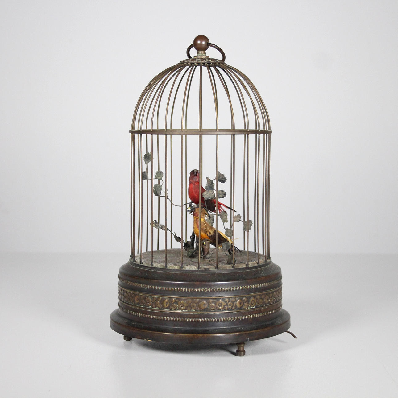 Spieluhr, Singvogelkäfig, um 1900.