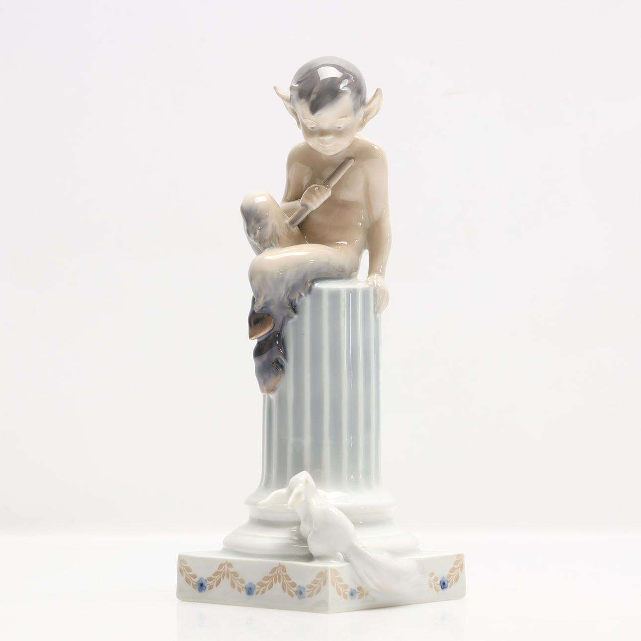 ROYAL COPENHAGEN, figurine, Faun on column with flute and winter hare, Christian Thomsen.
