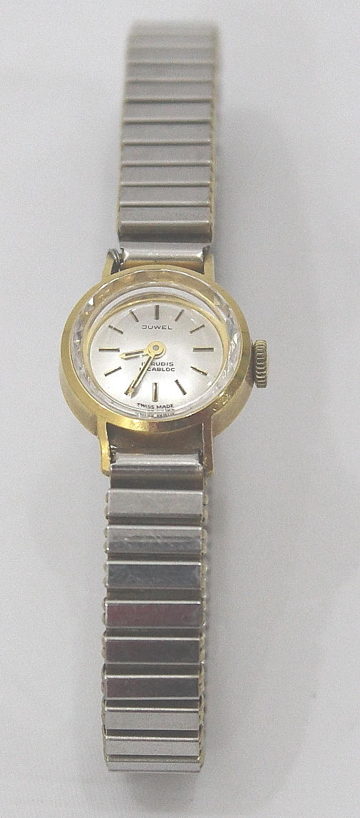 KLOCKA dam i 18 karats guld.