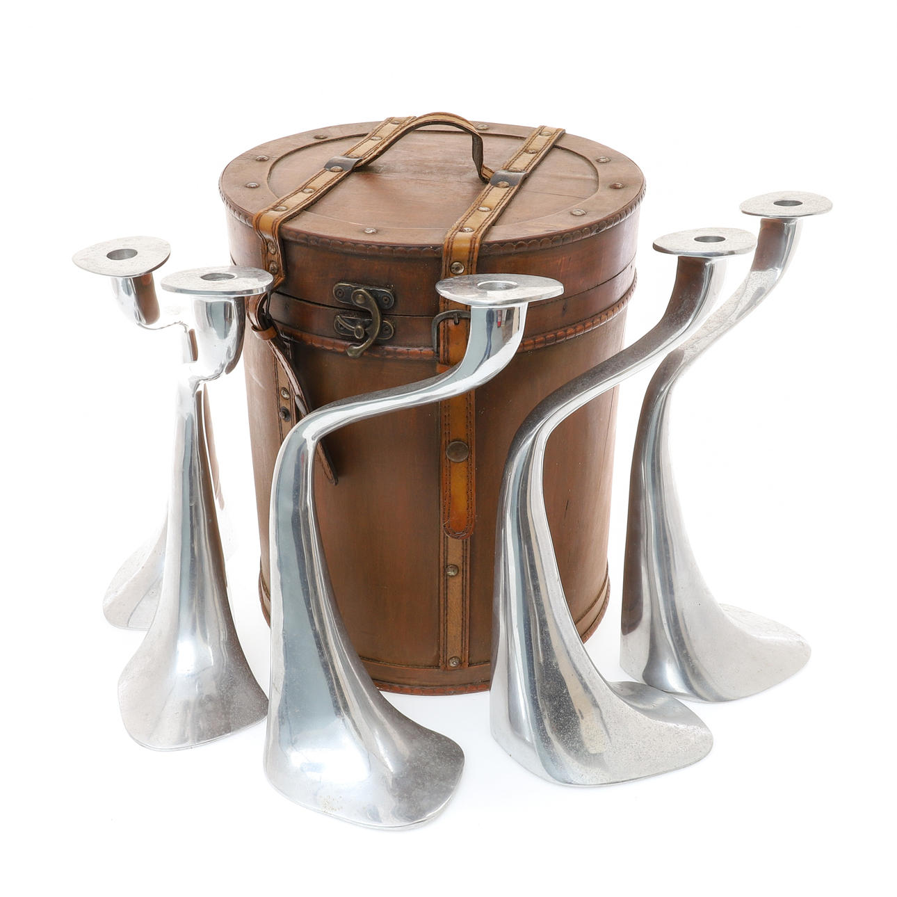 DRIADEKOSMO. A SET OF FIVE ALUMINIUM CANDLE HOLDERS.