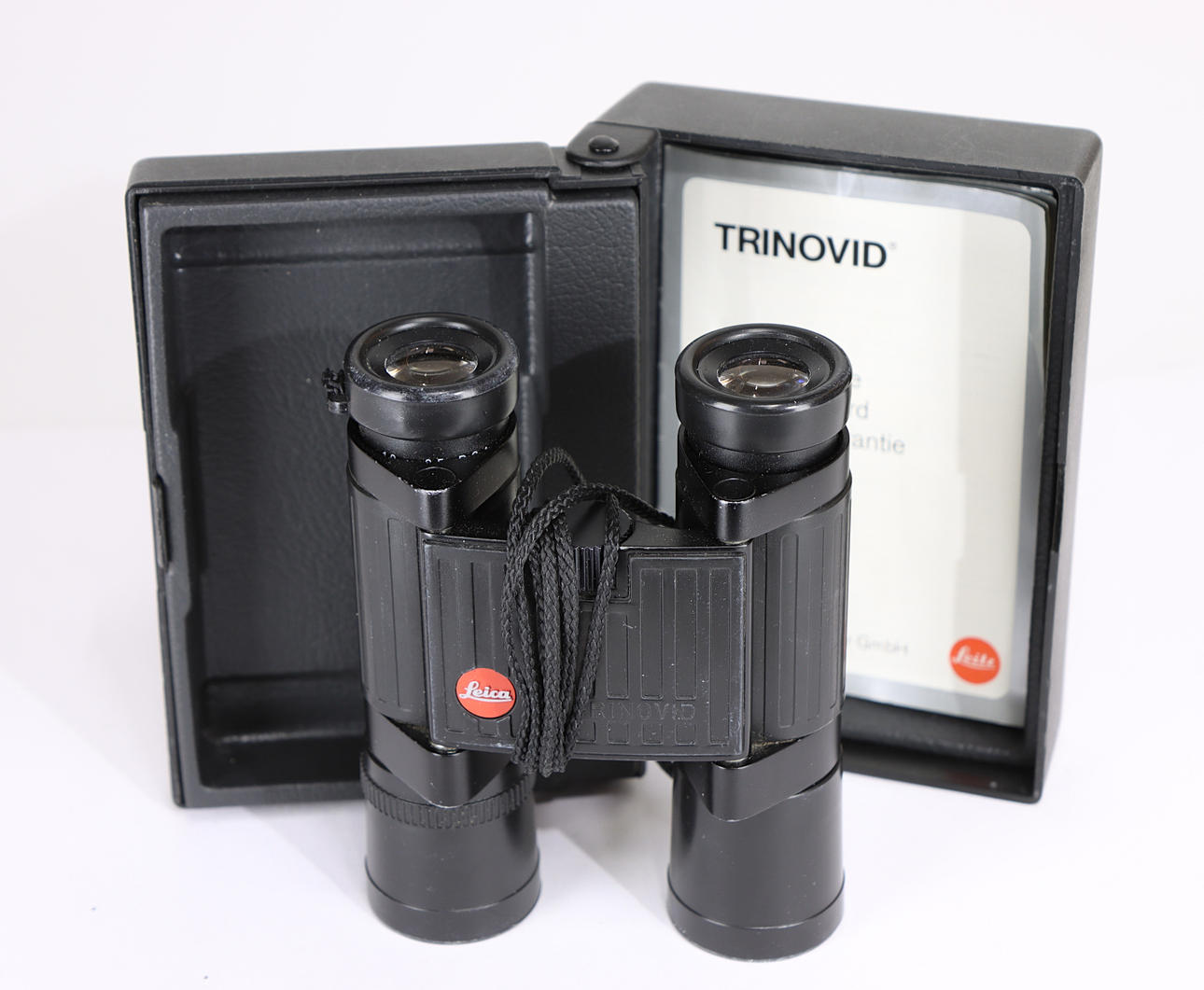 702. FERNGLAS, LEICA 10X25 BCA TRINOVID.