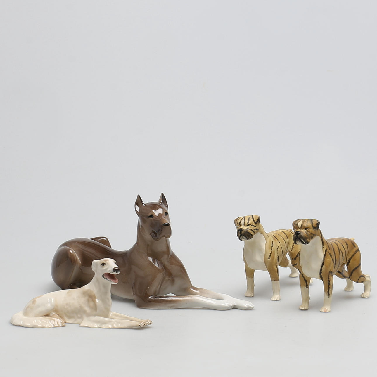 FIGURINER i porslin. 4 st. Hundar. Bla Ryssland.