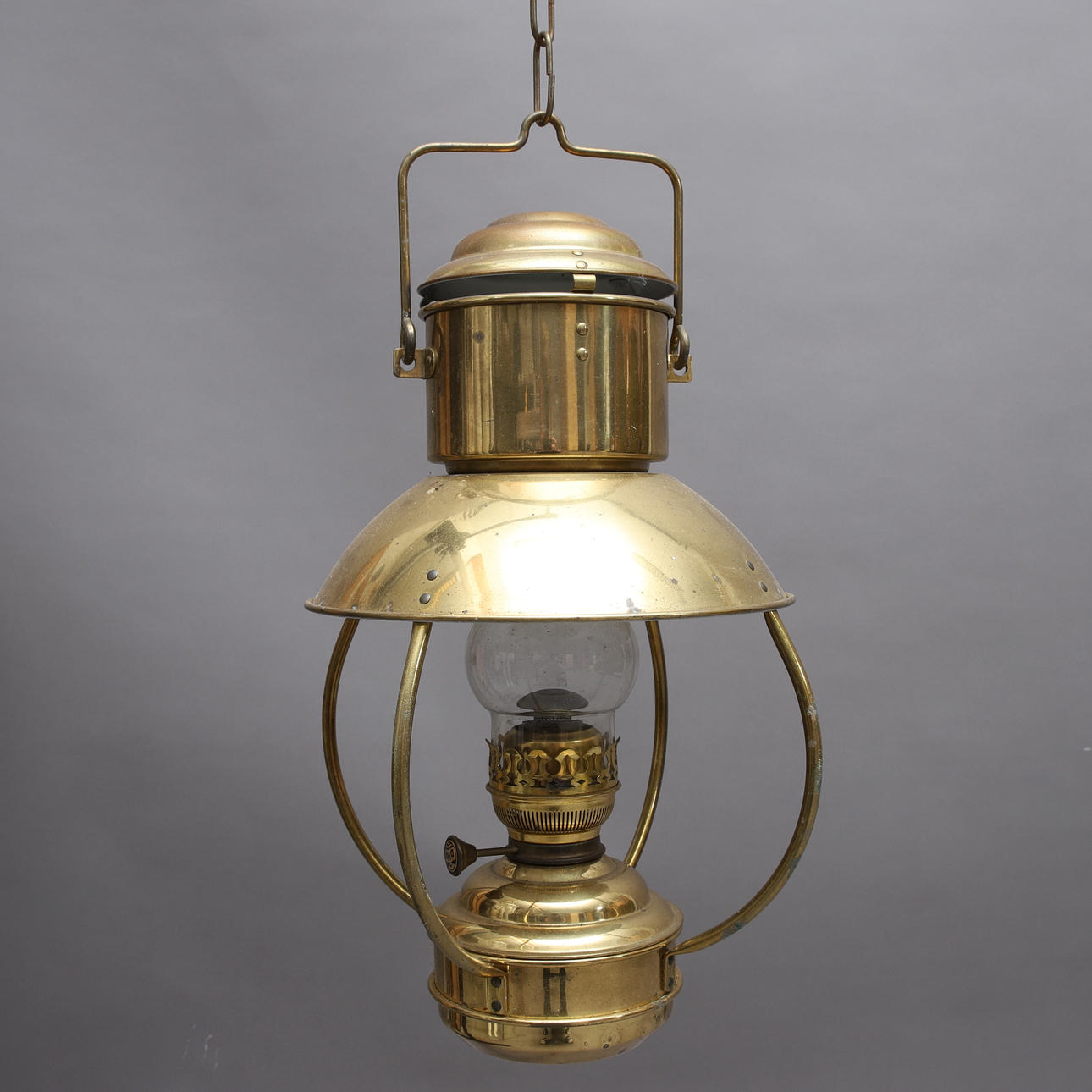 FOTOGENLYKTA, mässing, 1900-tal.