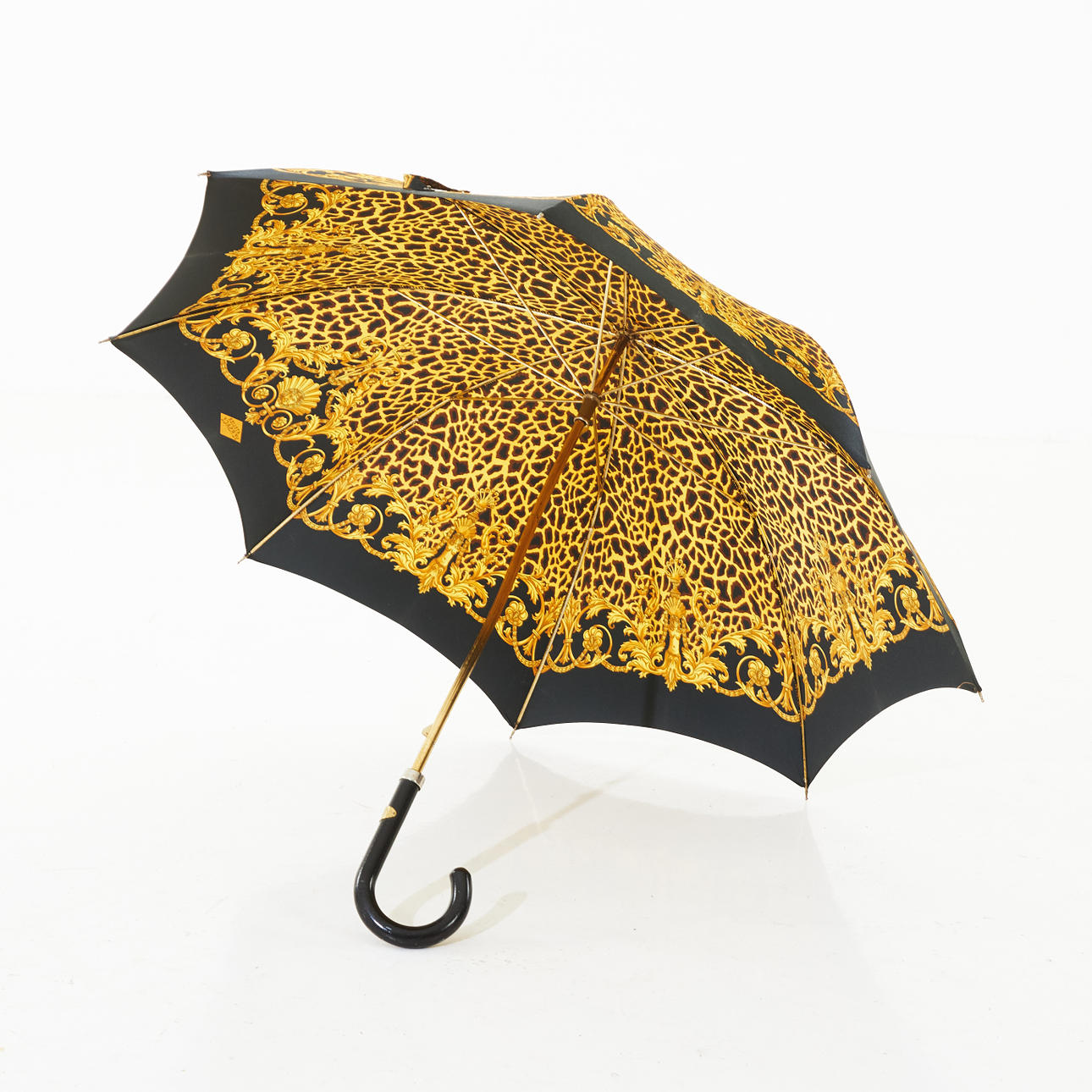 VERSACE, umbrella, marked with brass plaque, Gianni Versace.